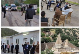 During the curfew, Yazidi workers take refuge in the Lalish Temple
