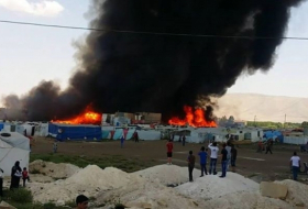 Пожар в лагере езидских беженцев в Дохуке