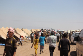 Families of ISIS terrorists transferred from Syria to an Iraqi camp for Yazidi refugees