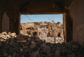 Yazidi neighborhoods began removing construction debris that left after the 2014 war
 