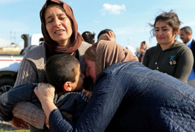 Yazidis held captive by ISIL reunite with their families in Iraq